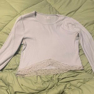 Large Hollister Light Blue long sleeve tee with lace detail on bottom